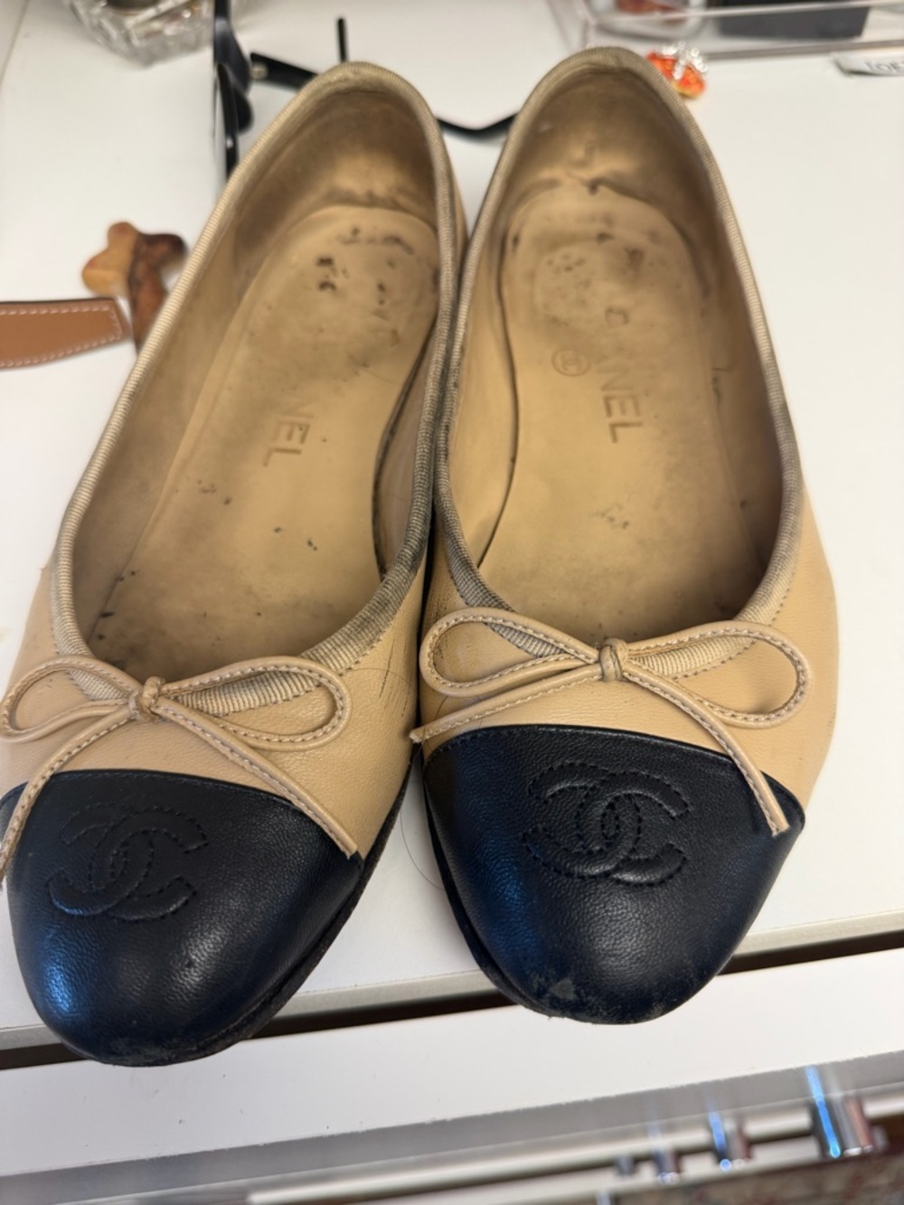 CHANEL Beige and Black Cap-Toe Leather Ballet Flats